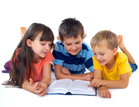 Children enjoying reading a book