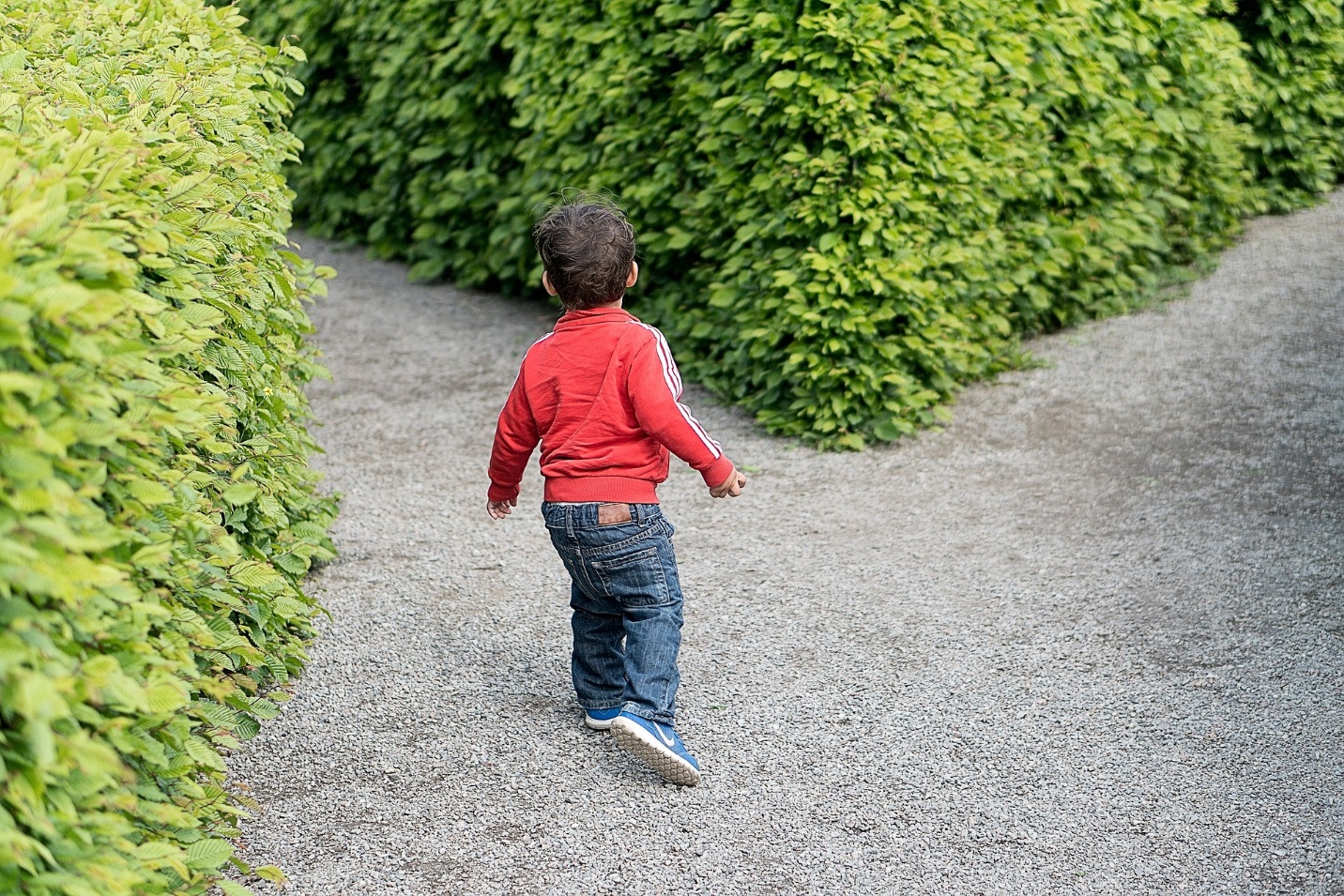 Boy running in a maze